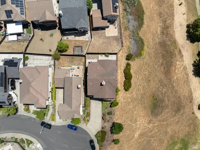 an aerial view of a city with lots of residential buildings