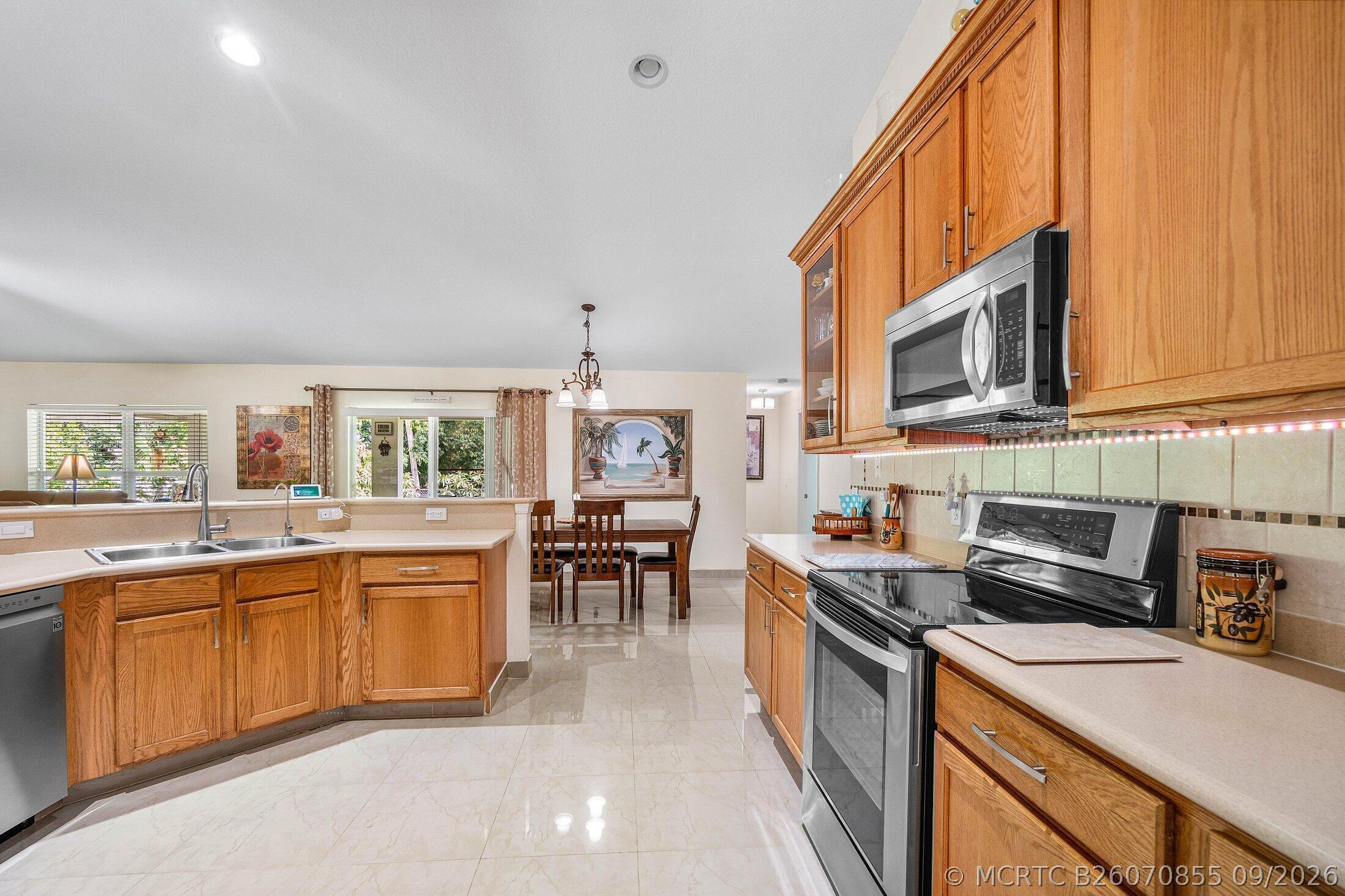 1629 Southwest Fortune Road Port St. Lucie, FL 34953 - Photo 16 of 33 Kitchen