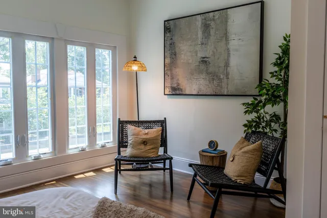 a outdoor living space with furniture and a potted plant