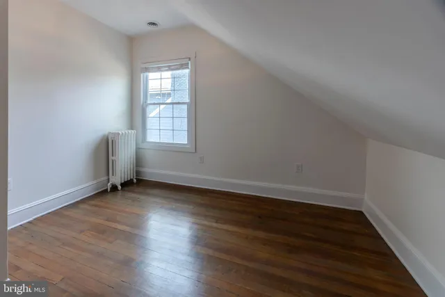 a bathroom with a toilet a sink and a bathtub