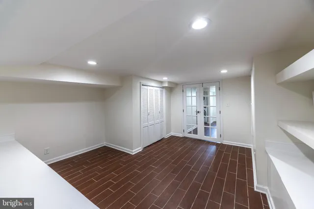 a view of a hallway with washer and dryer