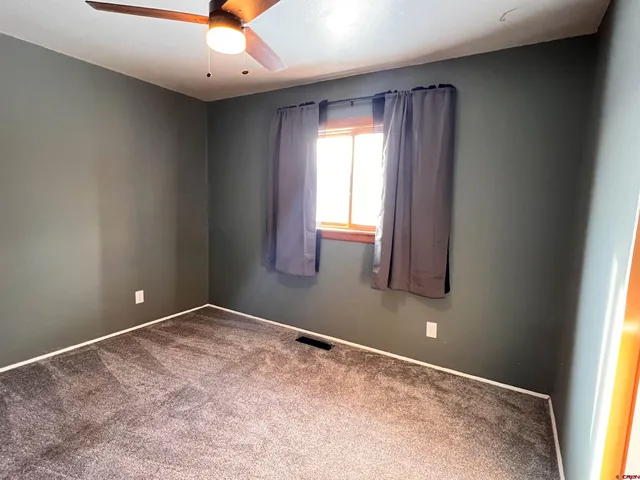 an empty room with window
