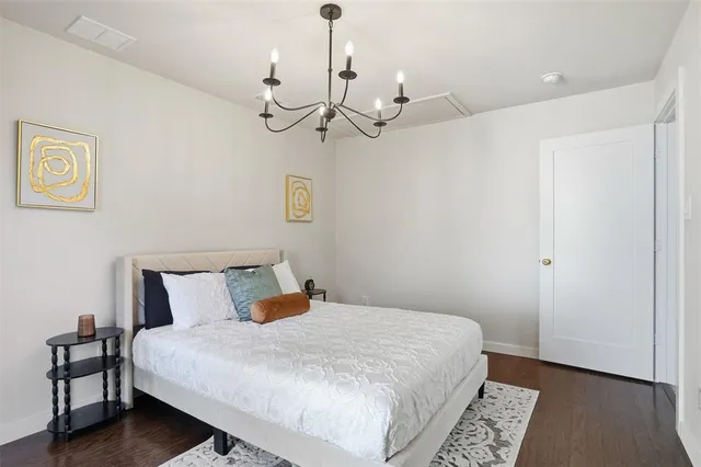 a bathroom with a double vanity sink mirror and shower