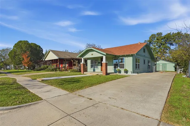a view of house with outdoor space and street view
