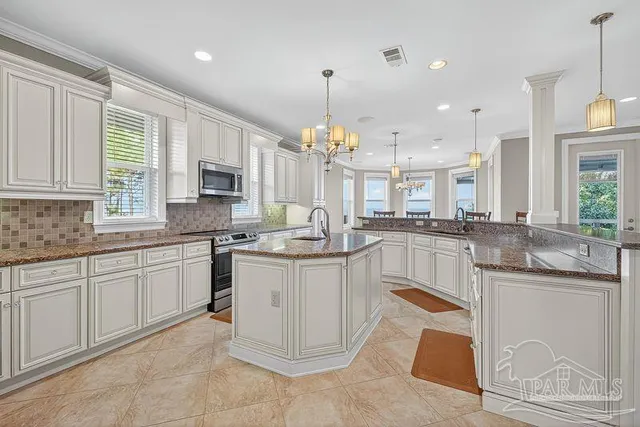 a kitchen with cabinets and counter space