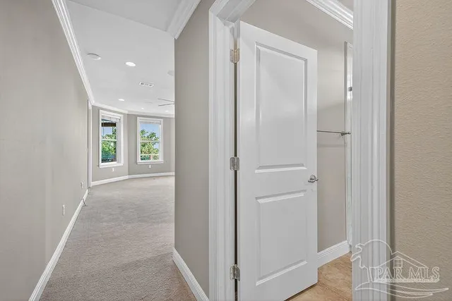 a view of an empty room with a bathroom