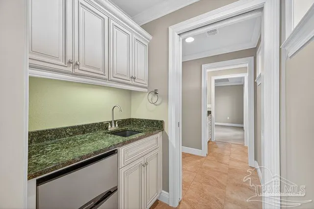 a view of an entryway with chandelier