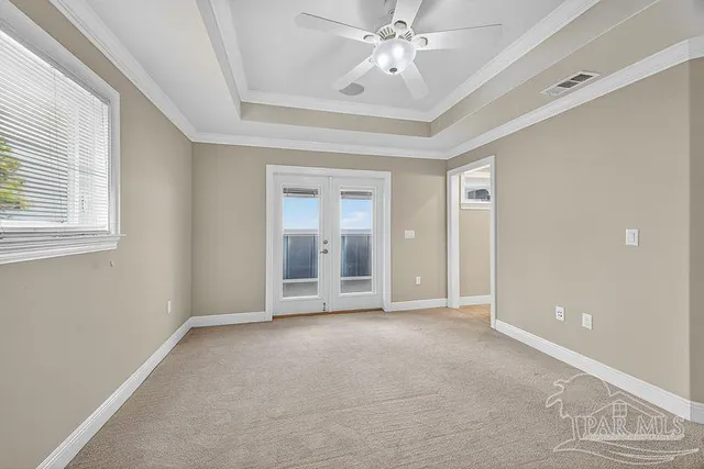 a view of a swimming pool with lounge chairs
