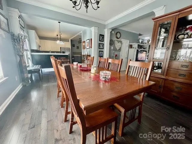 a view of a dining room with furniture