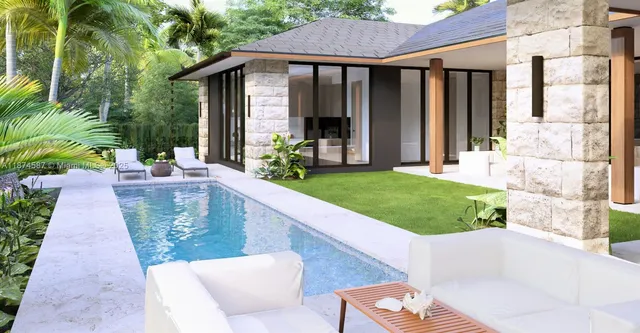 a view of a patio with couches chairs potted plants and floor to ceiling window and potted plants