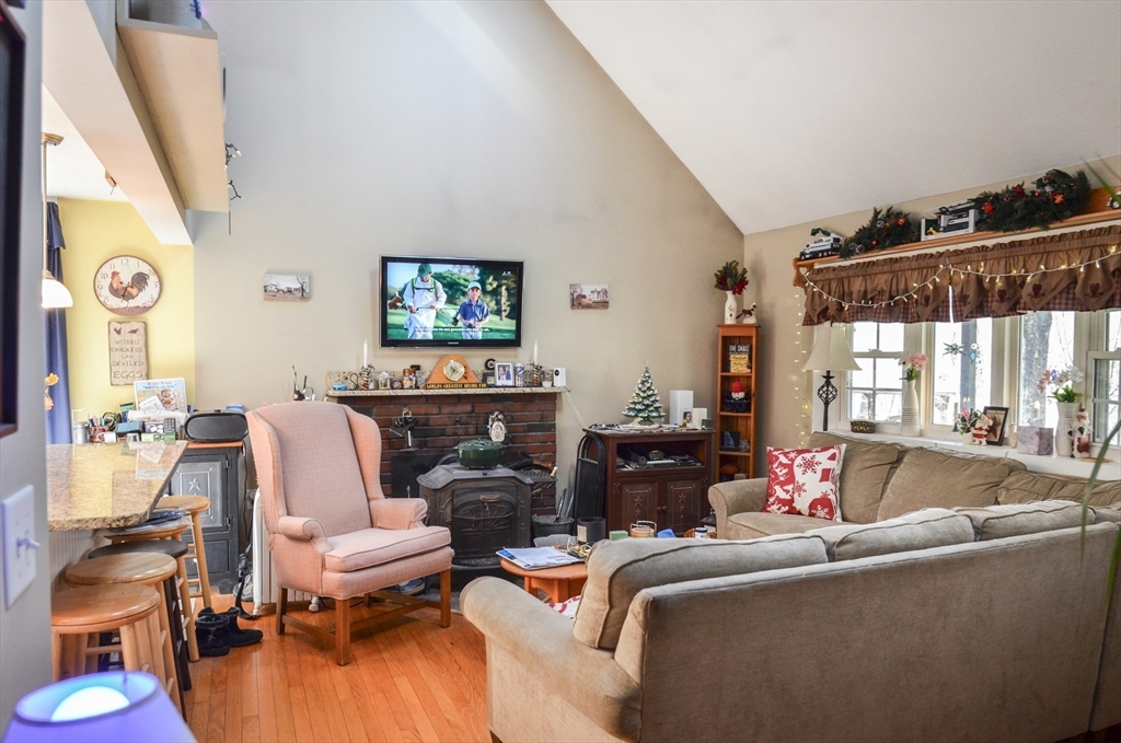 60 Marlboro Road Berlin, MA 01503 - Photo 17 of 34 a living room with furniture and a flat screen tv