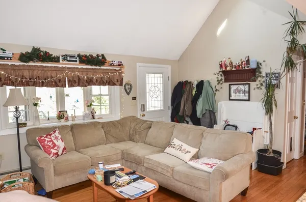 a living room with furniture and a window
