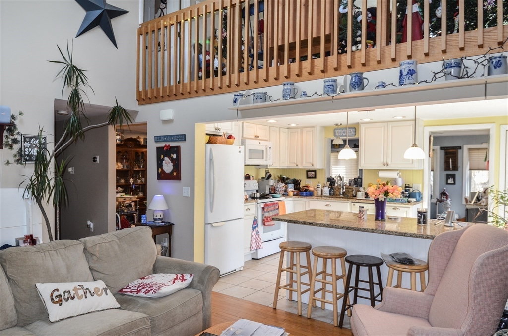 60 Marlboro Road Berlin, MA 01503 - Photo 20 of 34 a living room with furniture and a kitchen area