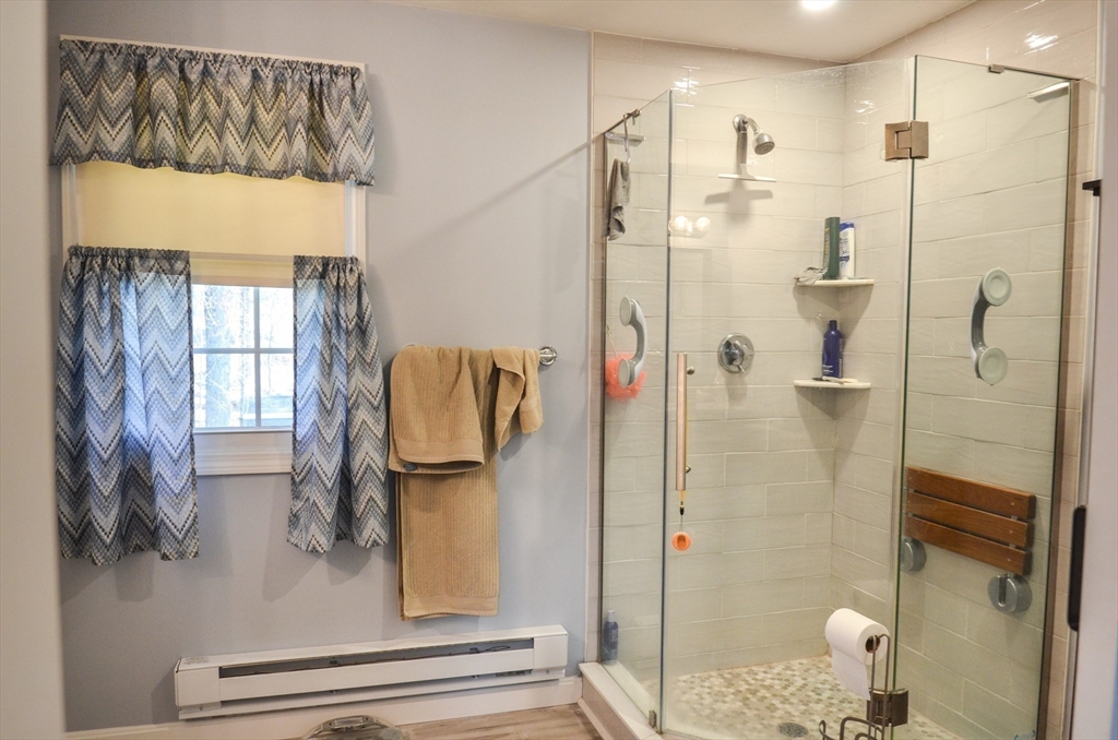 60 Marlboro Road Berlin, MA 01503 - Photo 26 of 34 a bathroom with a shower and a sink