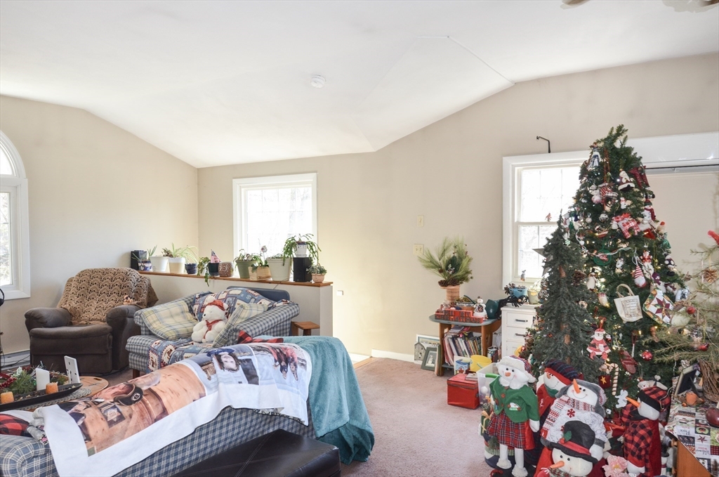 60 Marlboro Road Berlin, MA 01503 - Photo 27 of 34 a living room with furniture and a christmas tree