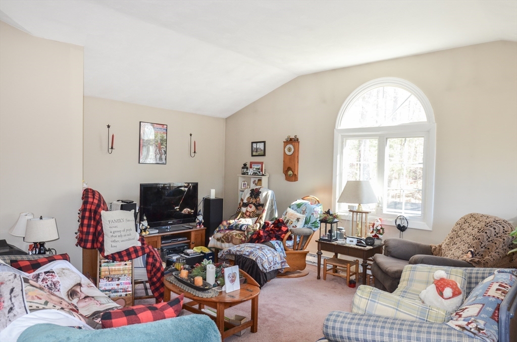 60 Marlboro Road Berlin, MA 01503 - Photo 29 of 34 a living room with furniture and a floor to ceiling window