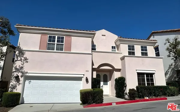 a front view of house with yard