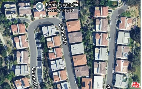 an aerial view of multi story residential apartment building