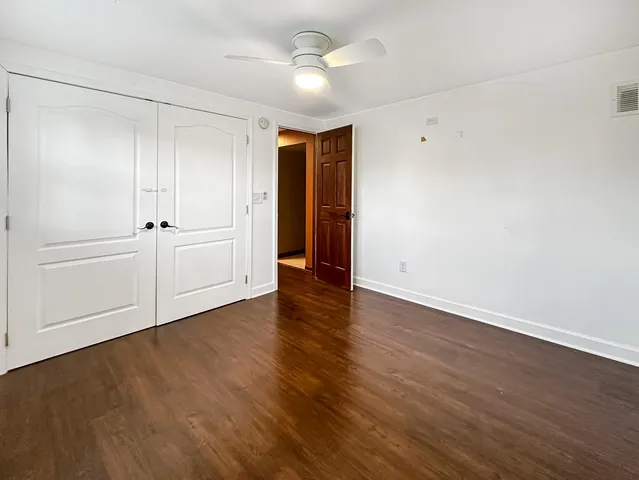a kitchen with stainless steel appliances a stove a microwave and a refrigerator