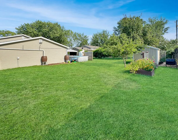 a view of a house with a big yard