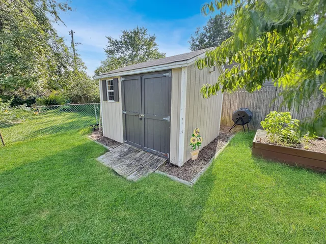 a view of house with outdoor space