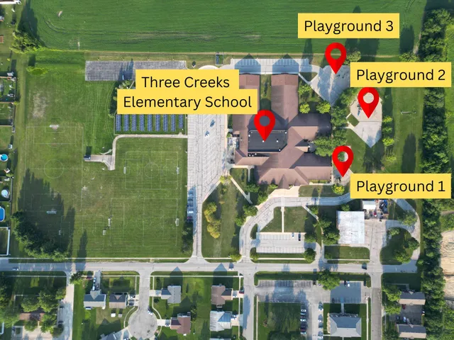 a view of a park with swings