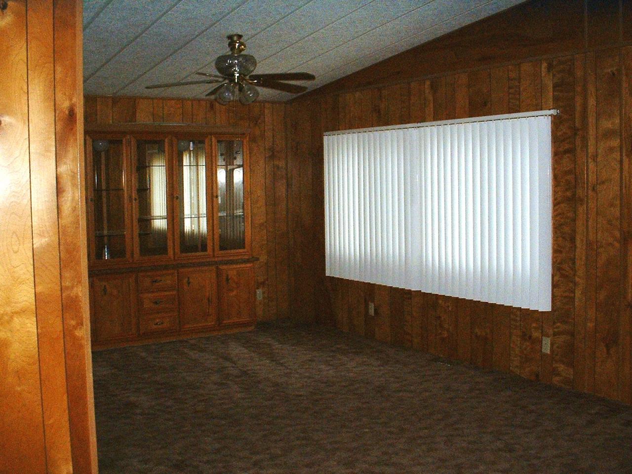 1102 Hillcrest Road Grandview, WA 98930 - Photo 5 of 9 a view of an empty room with a window