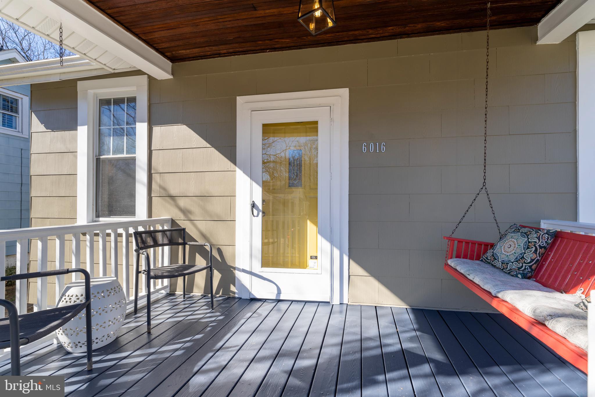 6016 Pinehurst Road Baltimore, MD 21212 - Photo 4 of 19 Warm Welcoming Porch W/Swing
