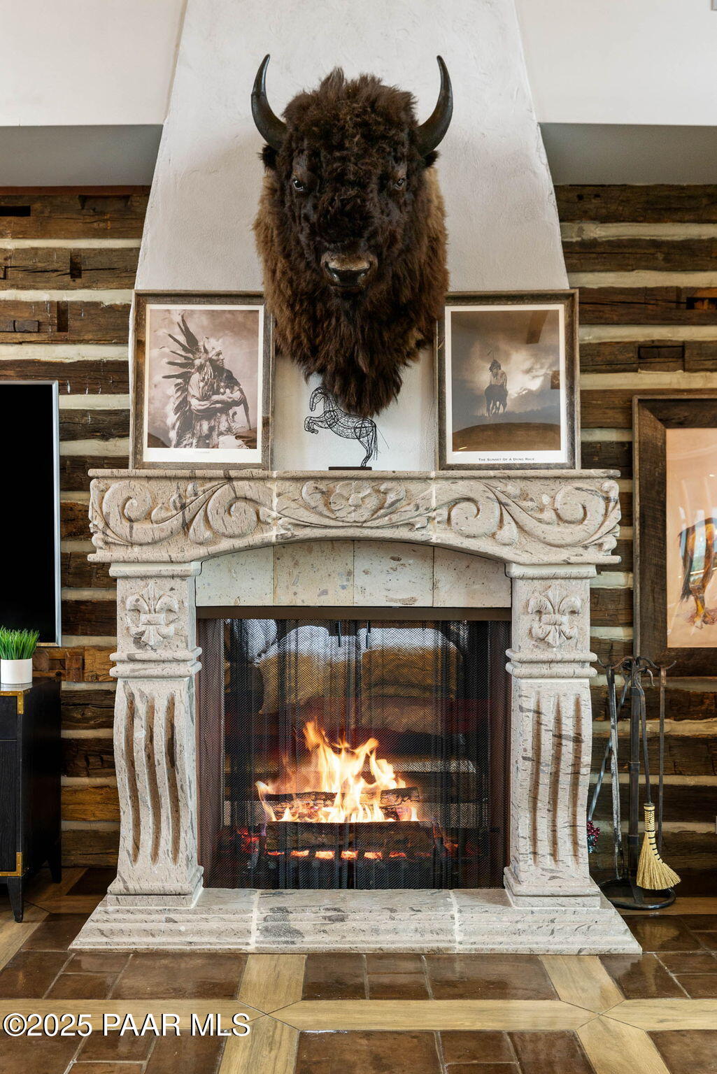 14800 North Puntenney Road Prescott, AZ 86305 - Photo 11 of 100 a fireplace with a clock on top of it