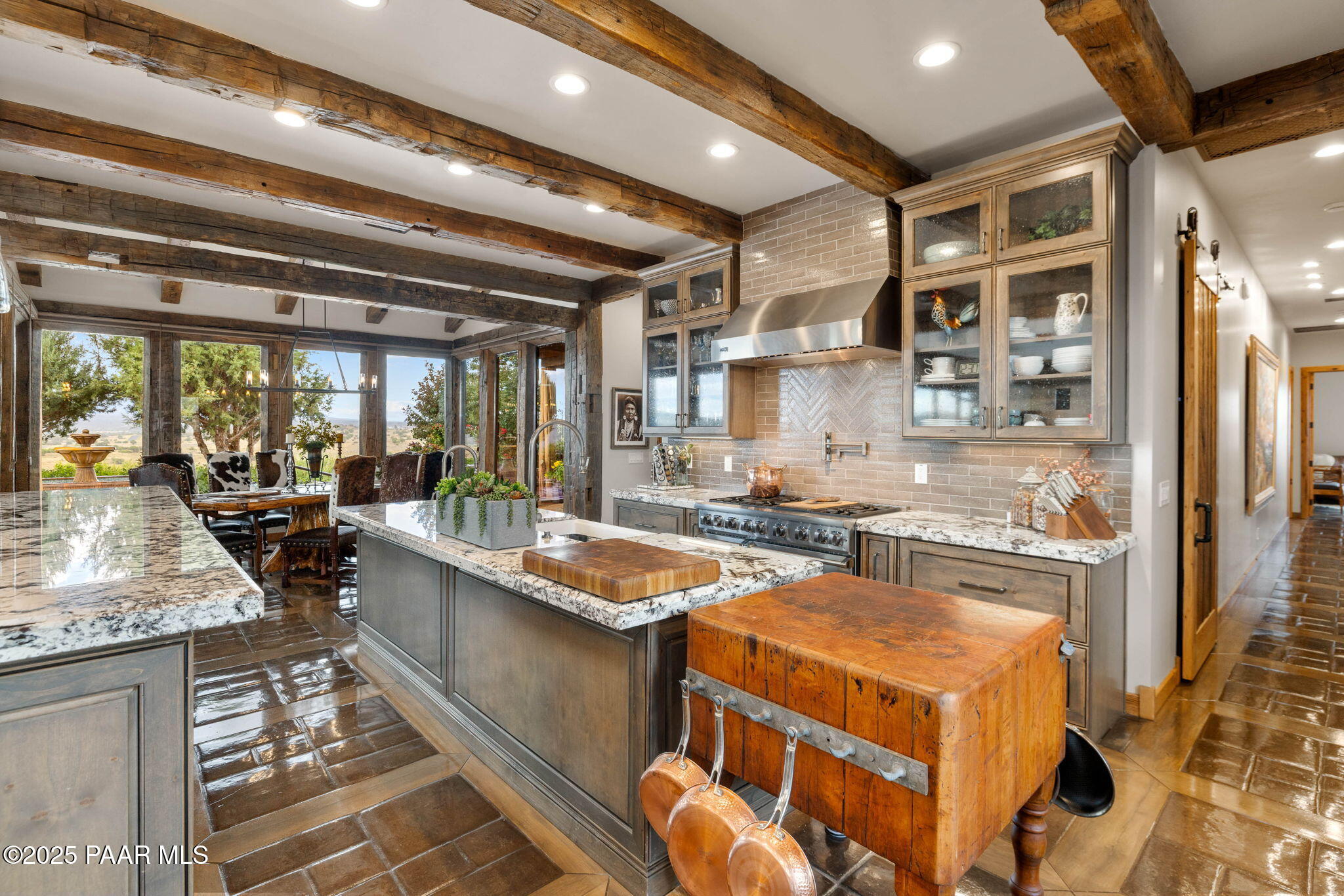14800 North Puntenney Road Prescott, AZ 86305 - Photo 18 of 100 a kitchen with stainless steel appliances granite countertop a stove and a sink