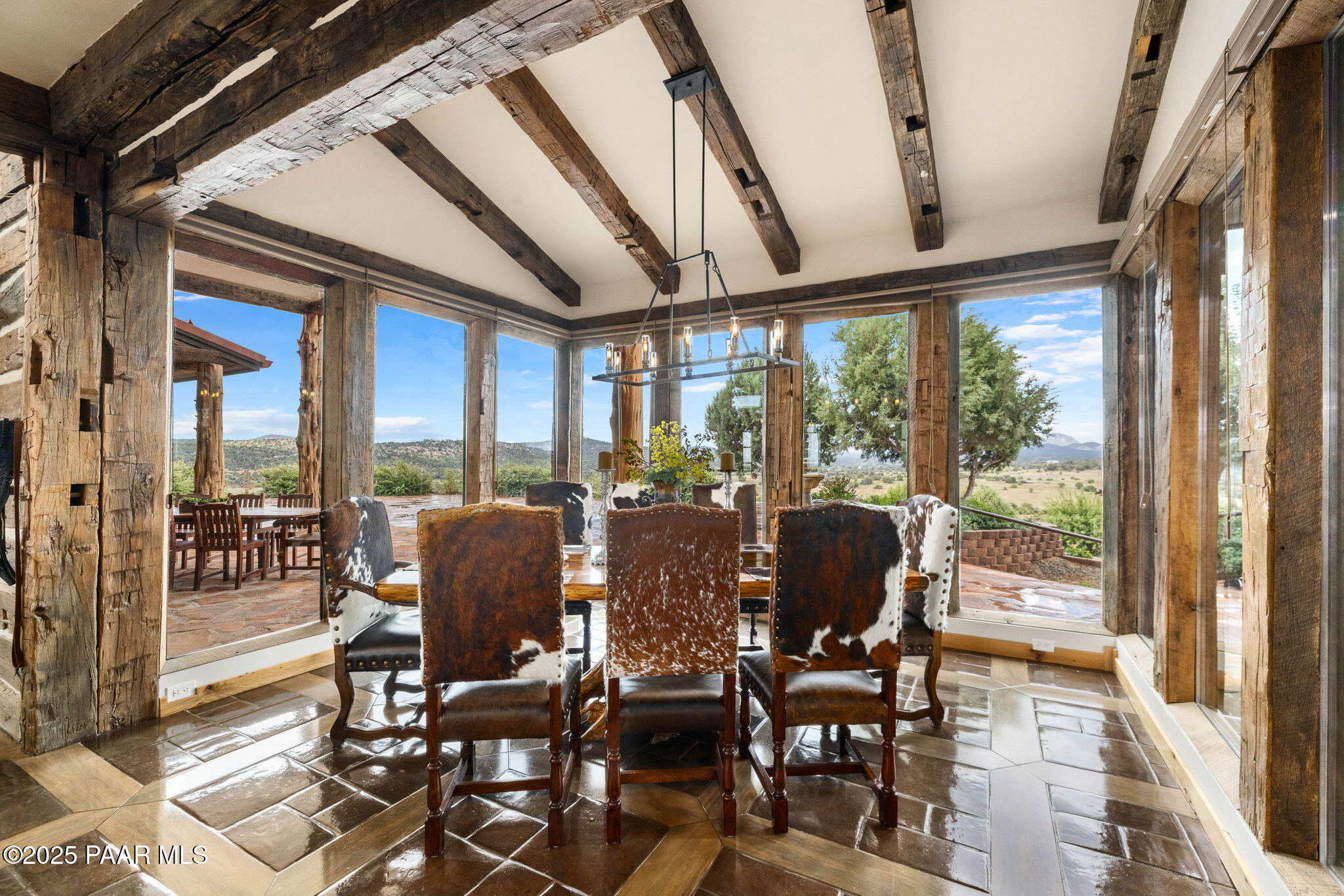 14800 North Puntenney Road Prescott, AZ 86305 - Photo 22 of 100 a view of a living room with furniture and floor to ceiling windows