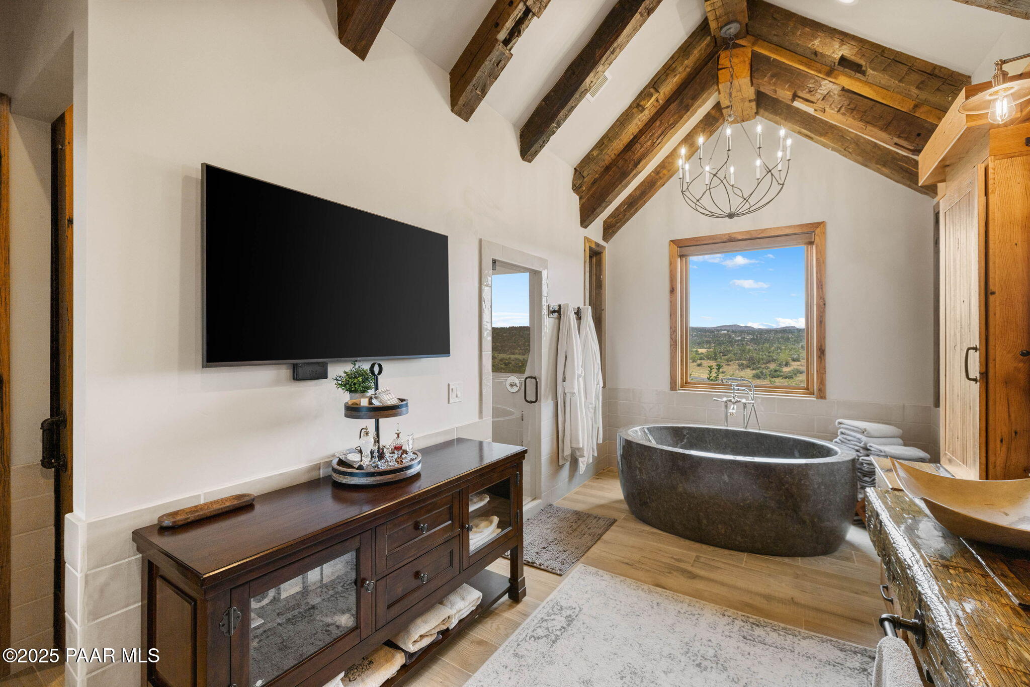 14800 North Puntenney Road Prescott, AZ 86305 - Photo 29 of 100 a living room with furniture and a flat screen tv