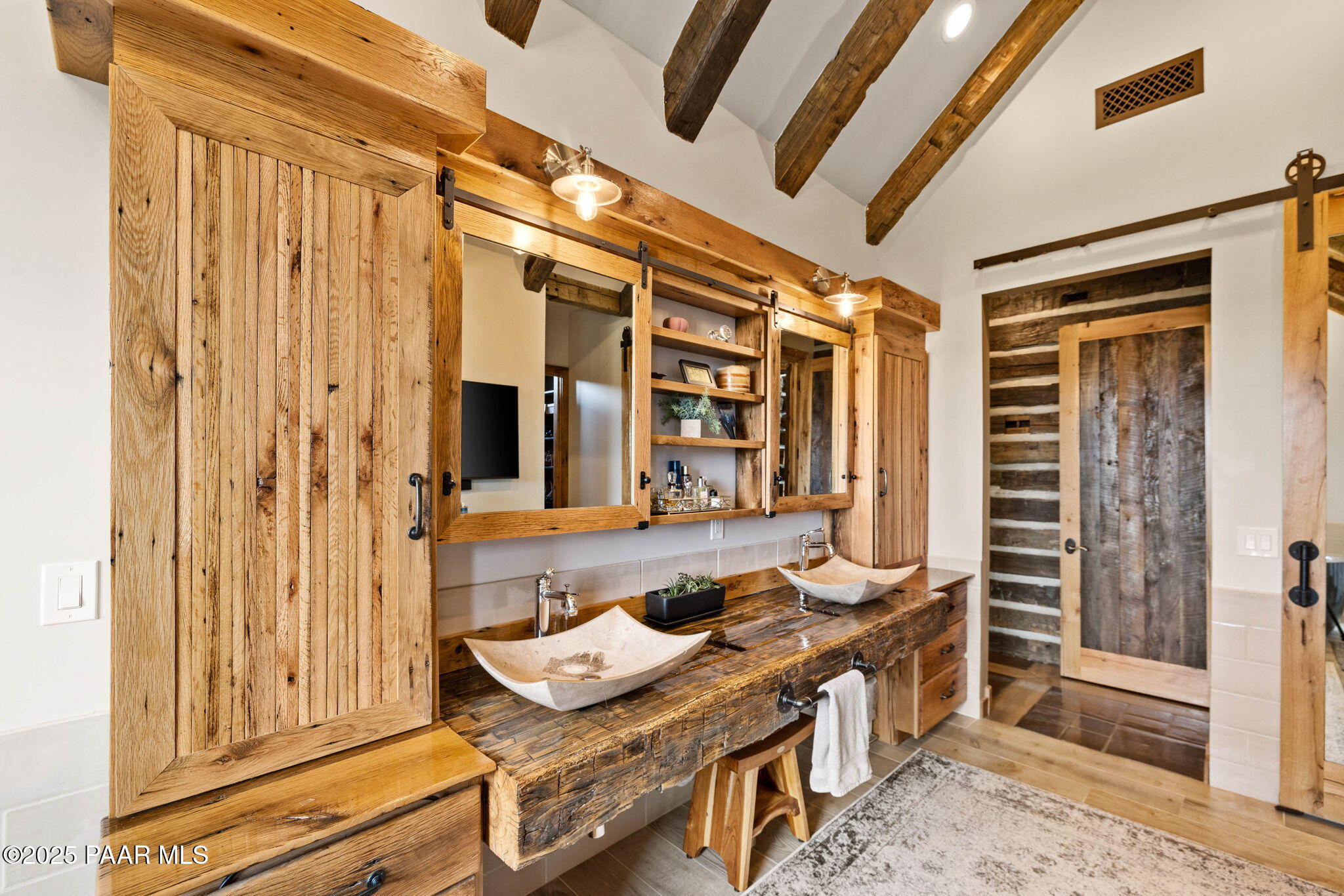 14800 North Puntenney Road Prescott, AZ 86305 - Photo 30 of 100 a bathroom with a granite countertop sink and a mirror