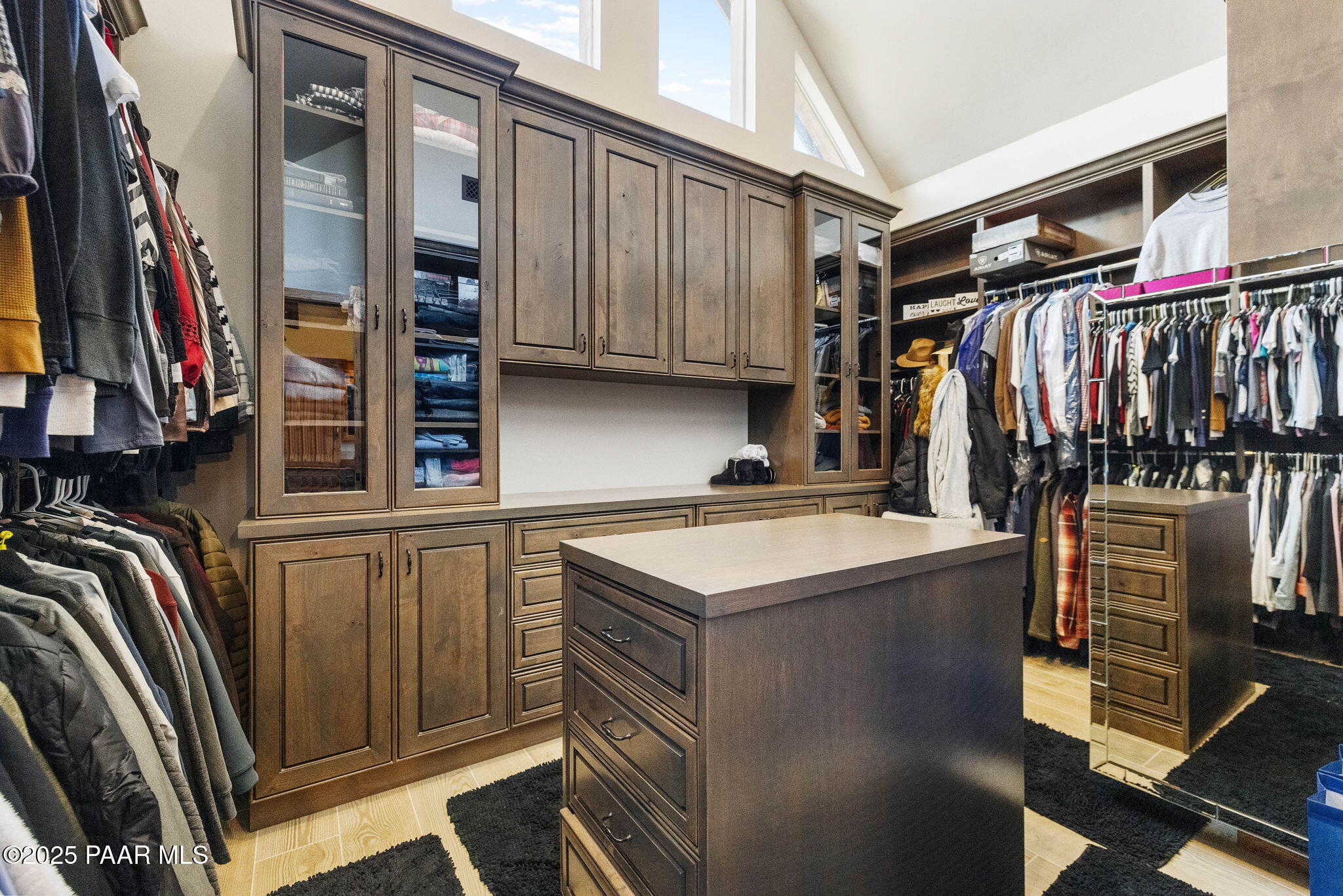 14800 North Puntenney Road Prescott, AZ 86305 - Photo 34 of 100 a view of walk in closet with clothes and shoes