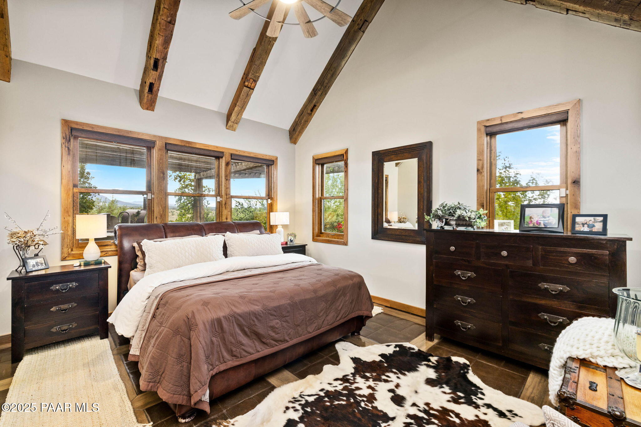 14800 North Puntenney Road Prescott, AZ 86305 - Photo 36 of 100 a bedroom with a bed and a dresser