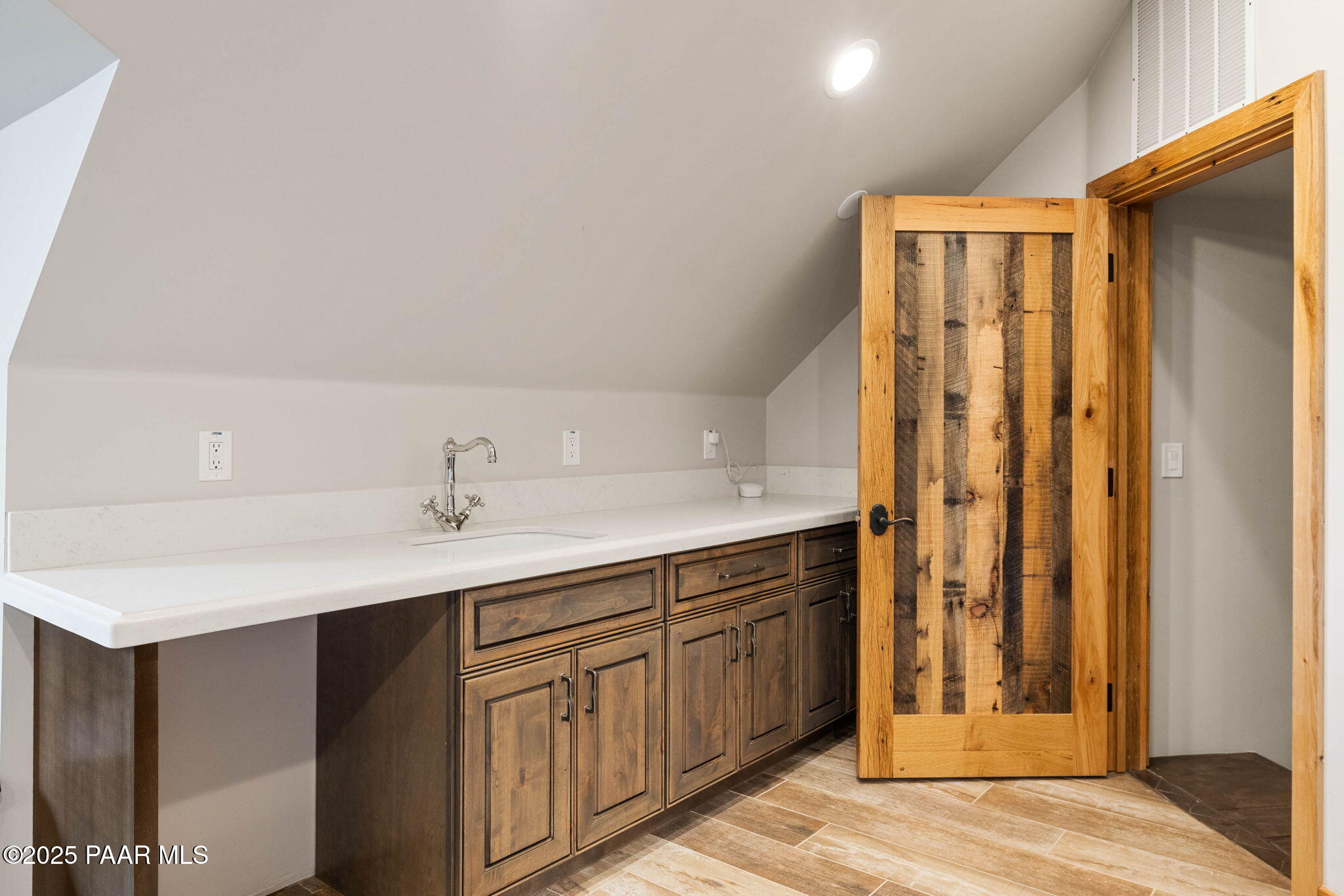 14800 North Puntenney Road Prescott, AZ 86305 - Photo 47 of 100 a bathroom with a sink and a mirror