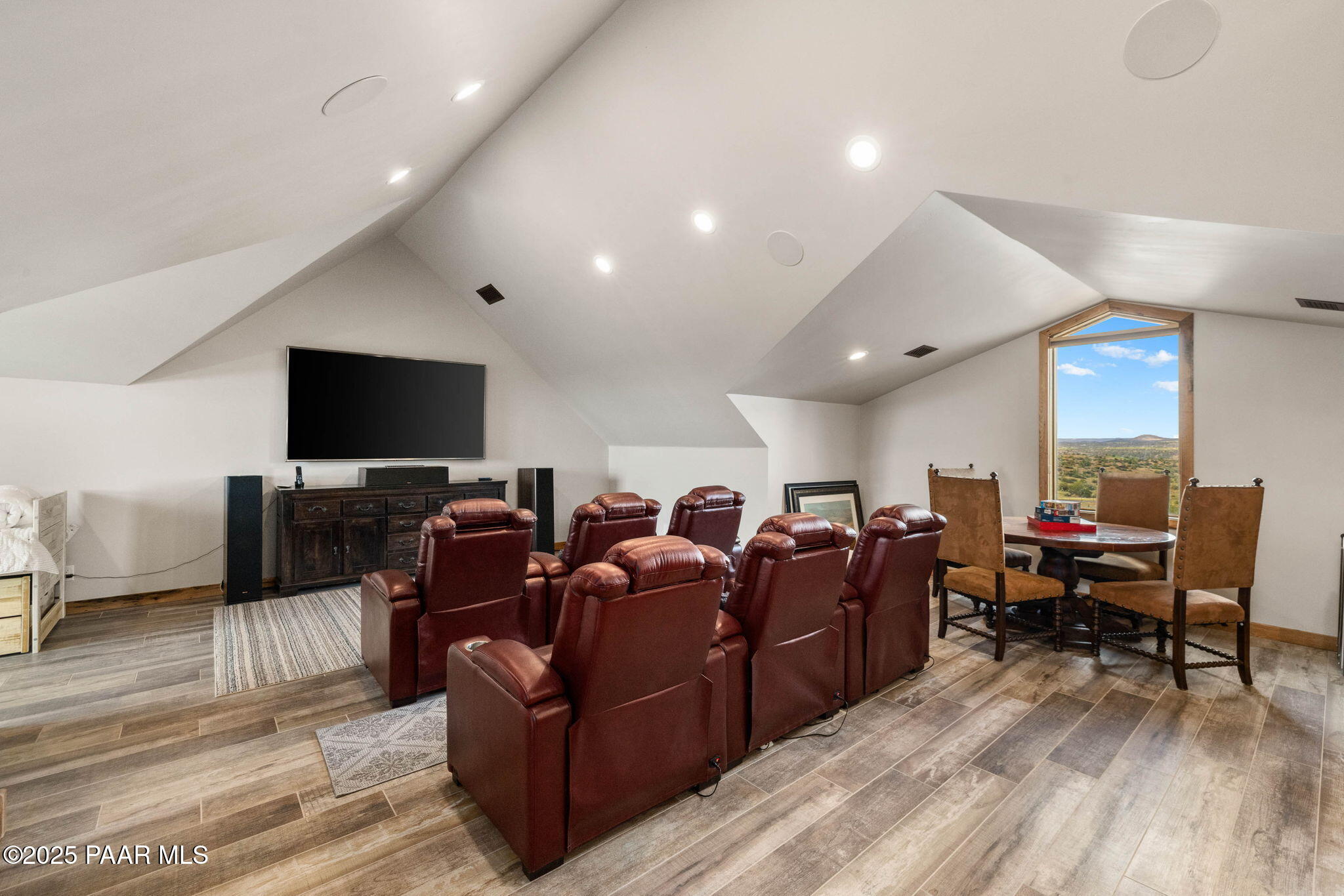 14800 North Puntenney Road Prescott, AZ 86305 - Photo 49 of 100 a living room with furniture and a flat screen tv