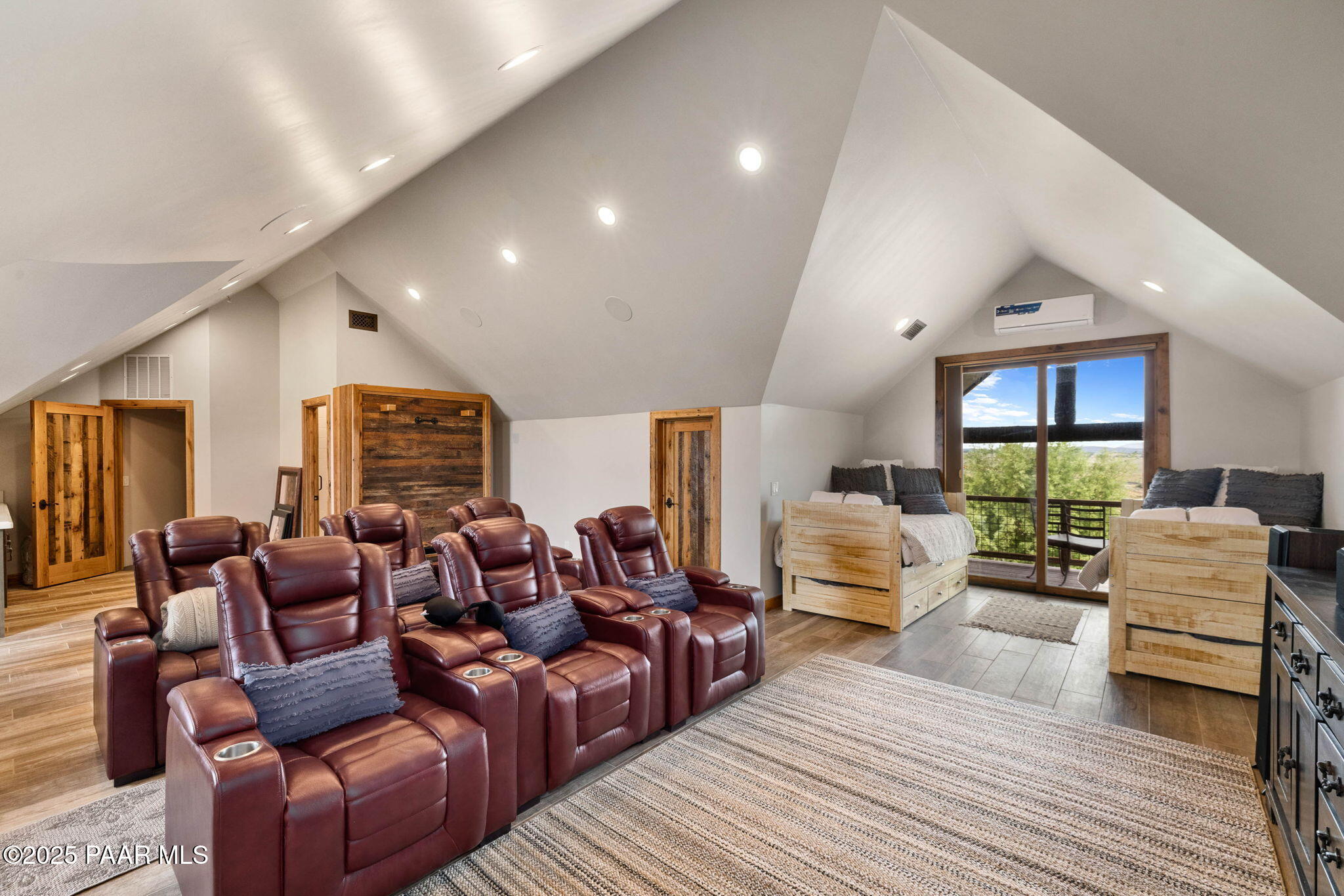 14800 North Puntenney Road Prescott, AZ 86305 - Photo 51 of 100 a living room with furniture and a wooden floor