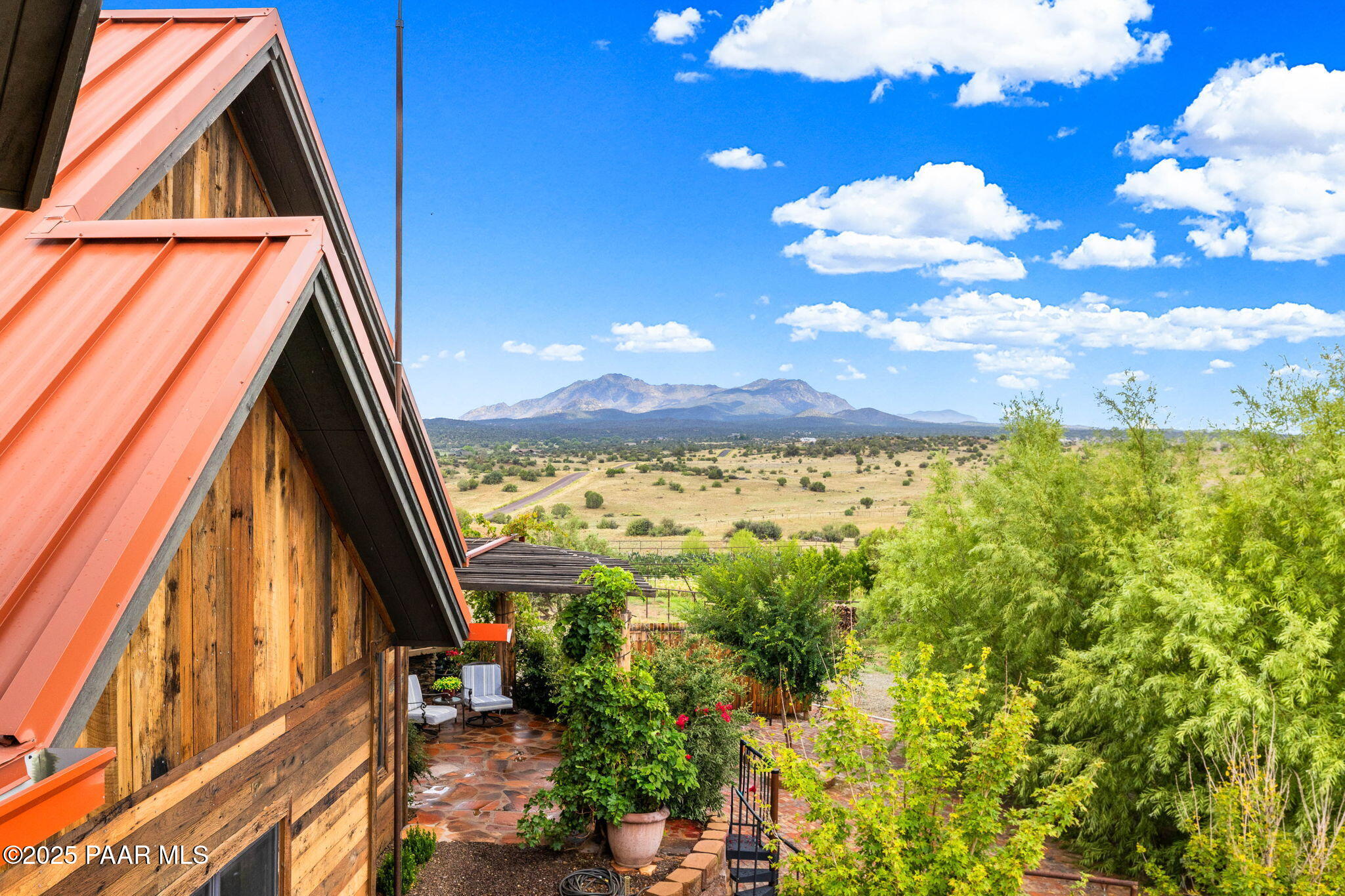 14800 North Puntenney Road Prescott, AZ 86305 - Photo 54 of 100 a view of a room with a large window and wooden floor