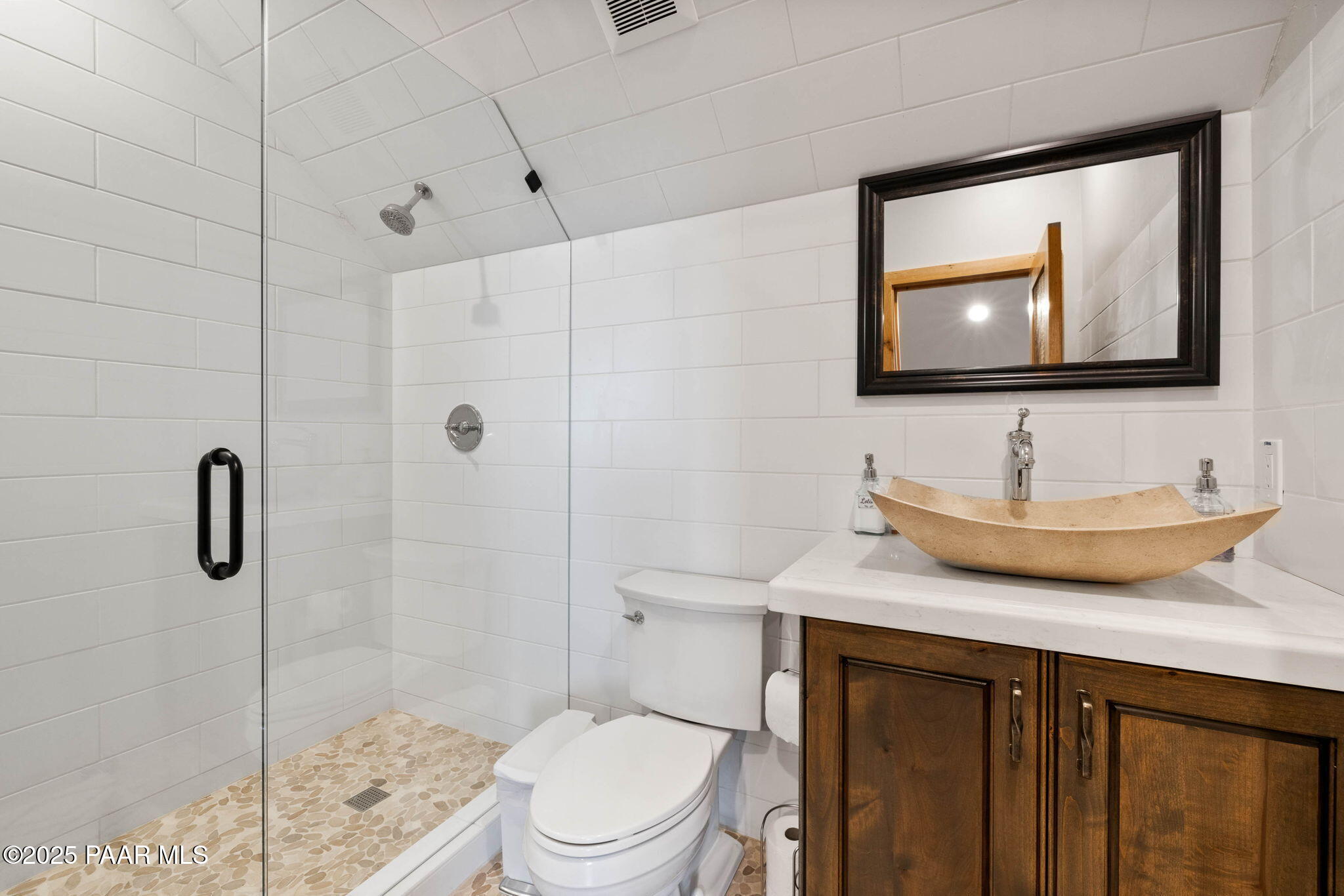 14800 North Puntenney Road Prescott, AZ 86305 - Photo 56 of 100 a bathroom with a granite countertop sink toilet and shower