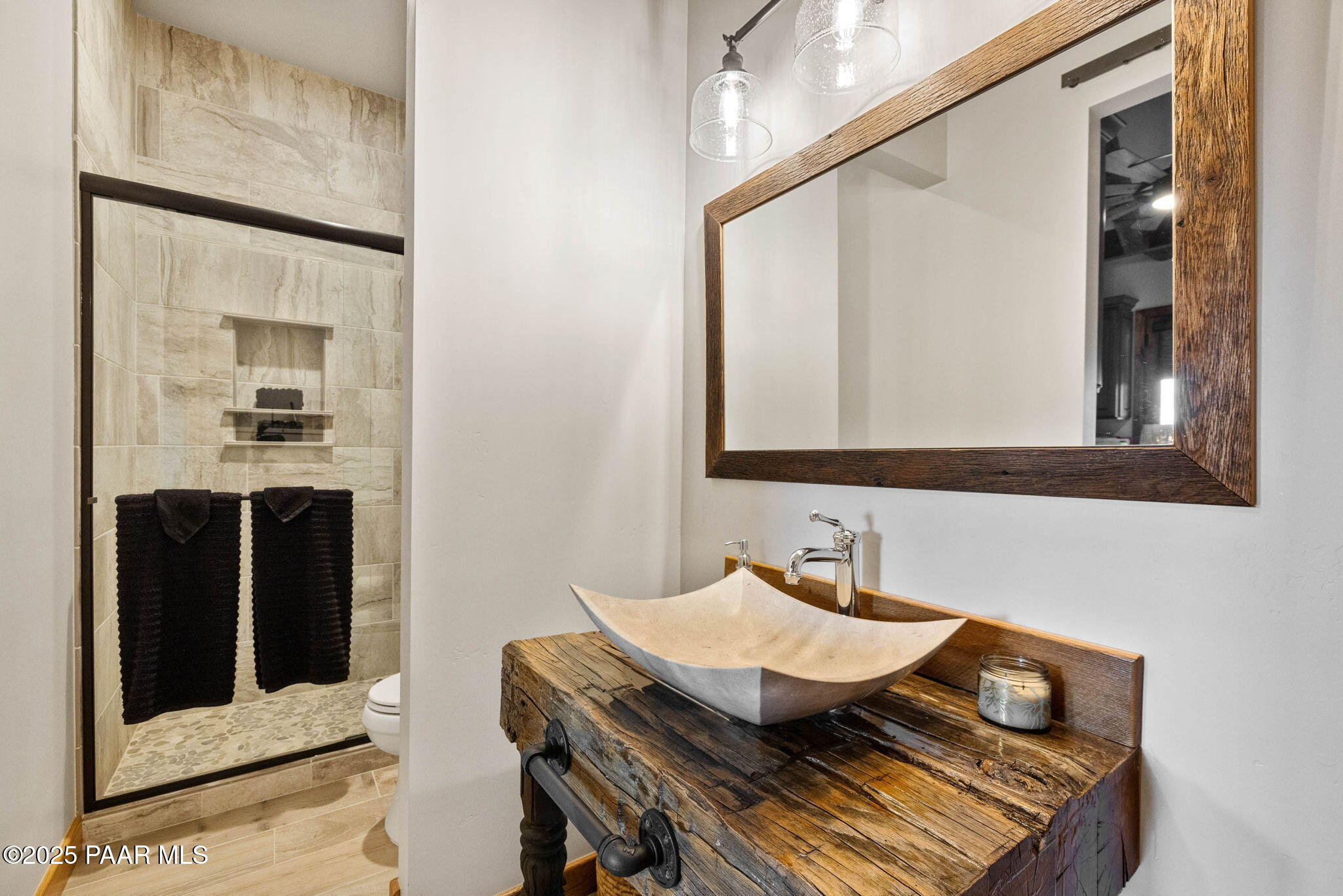 14800 North Puntenney Road Prescott, AZ 86305 - Photo 58 of 100 a bathroom with a sink and a mirror