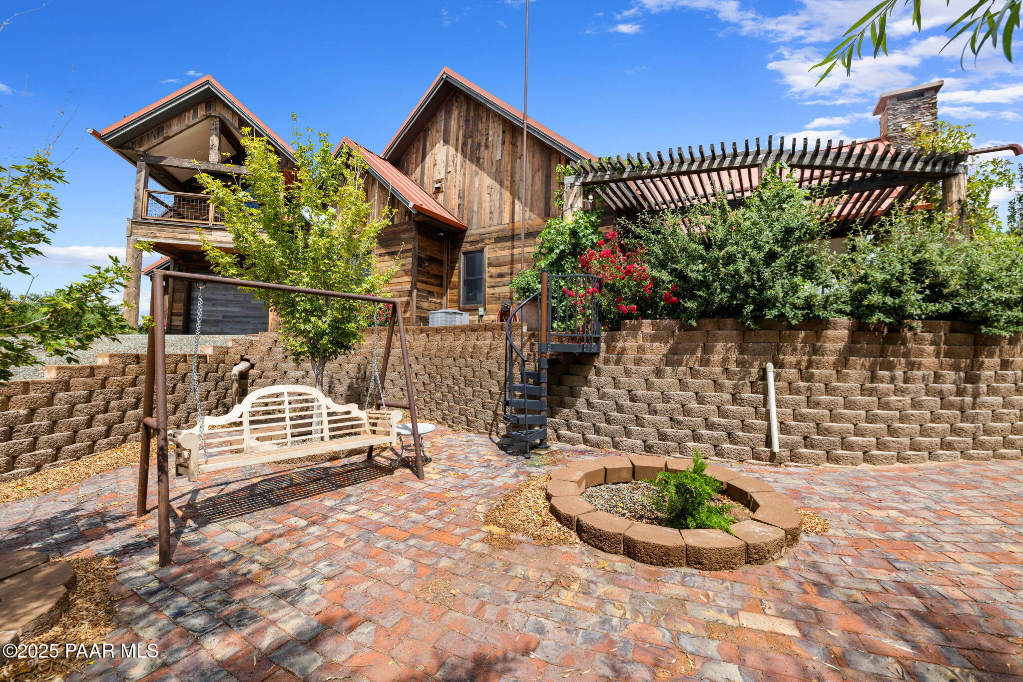 14800 North Puntenney Road Prescott, AZ 86305 - Photo 63 of 100 a view of a chair and table in backyard