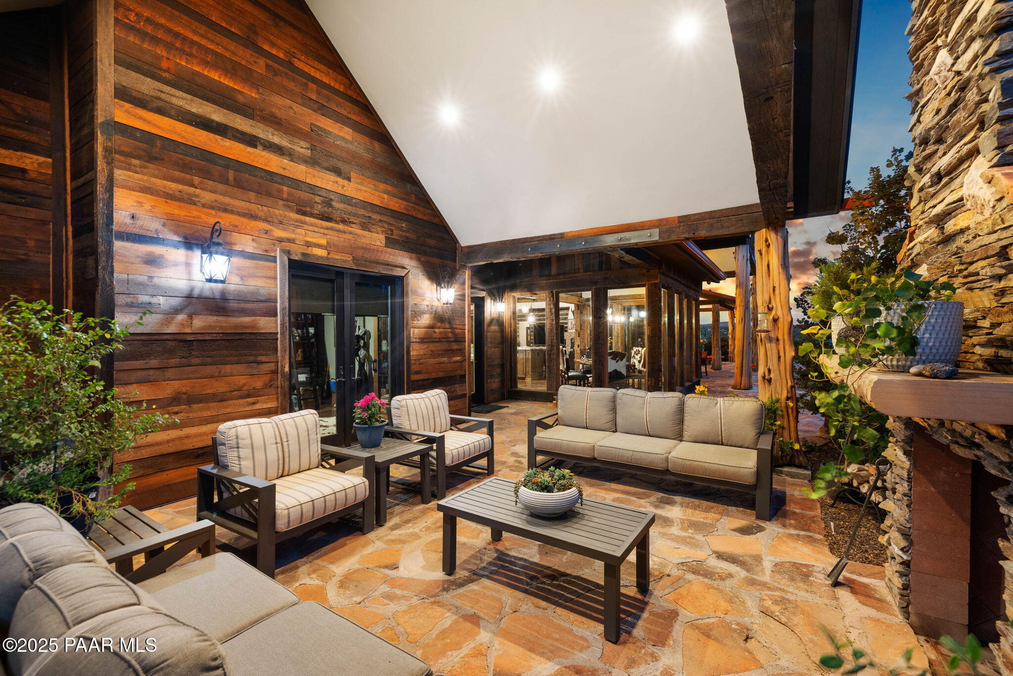 14800 North Puntenney Road Prescott, AZ 86305 - Photo 72 of 100 a outdoor living space with patio furniture and a potted plant