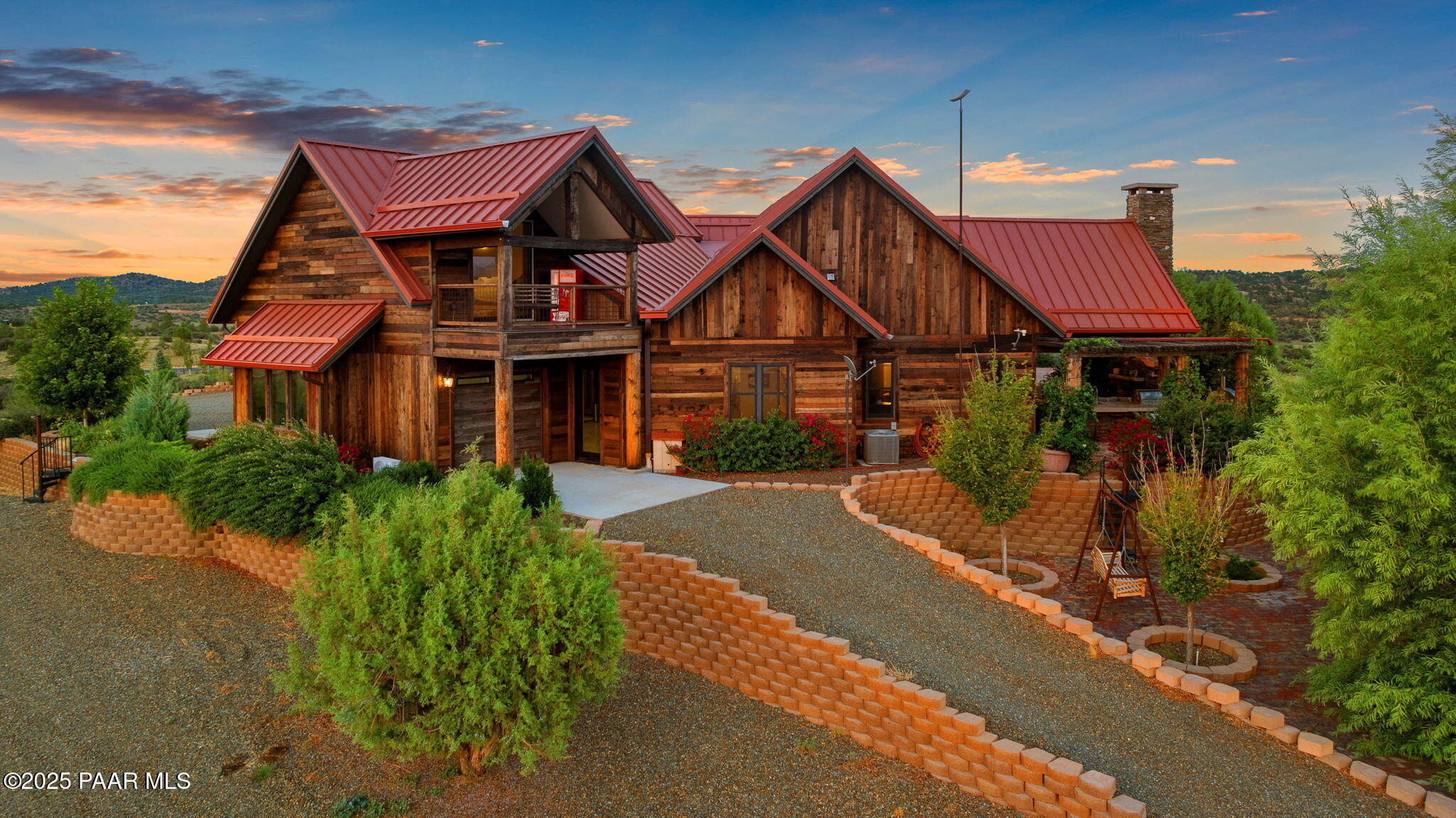 14800 North Puntenney Road Prescott, AZ 86305 - Photo 77 of 100 a front view of a house with a yard and potted plants