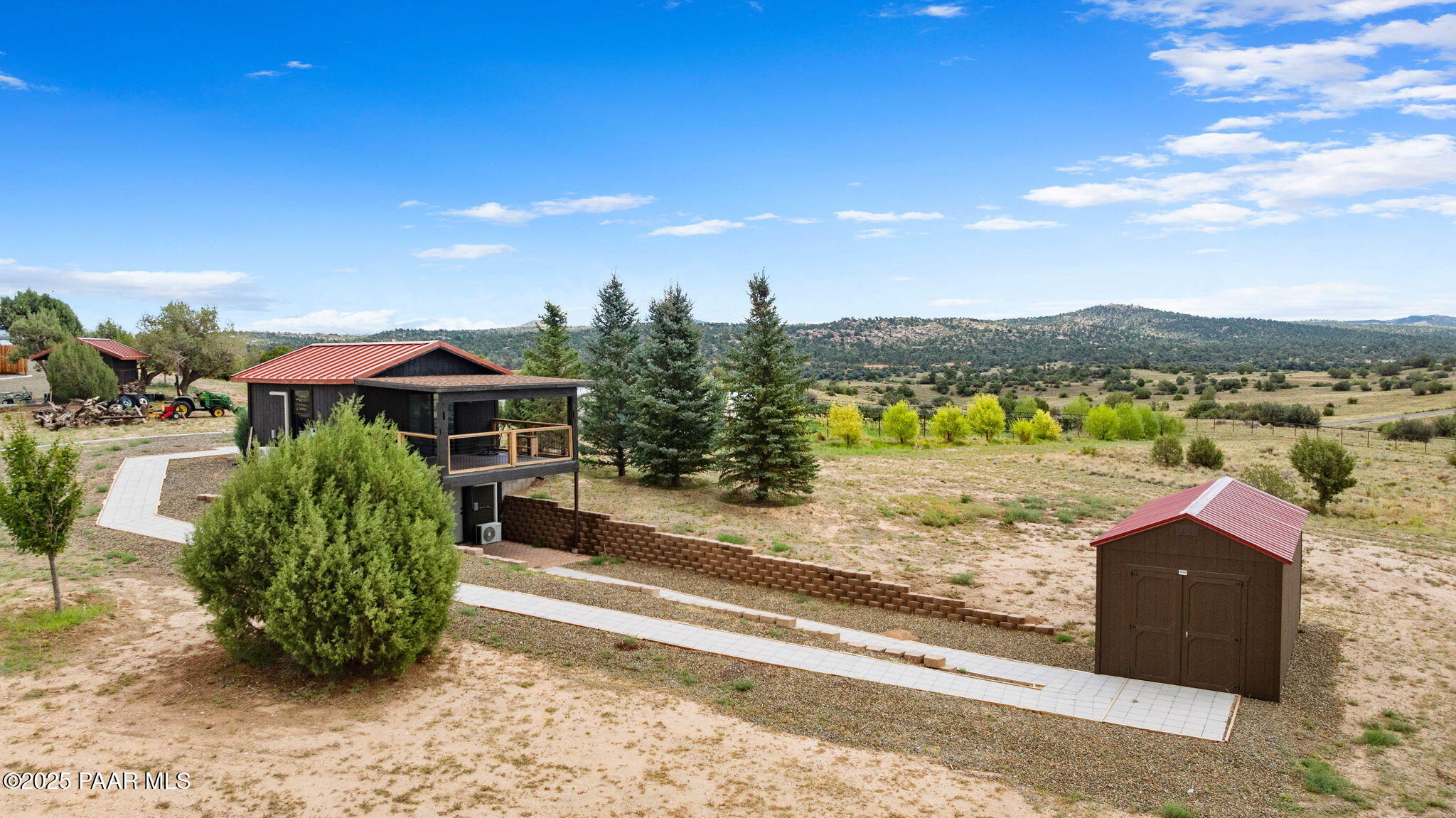 14800 North Puntenney Road Prescott, AZ 86305 - Photo 80 of 100 a view of a lake with a mountain