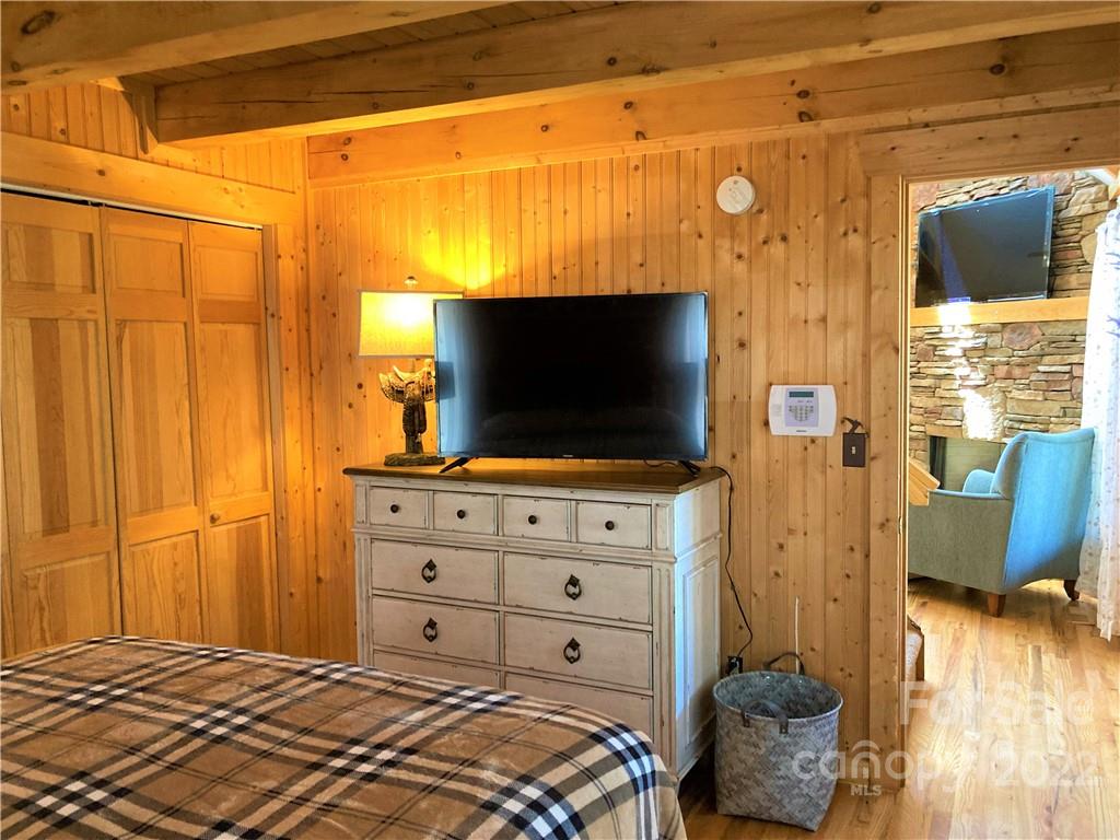 268 Sasafras Ridge Rutherfordton, NC 28139 - Photo 15 of 48 a bedroom with a bed and flat screen tv