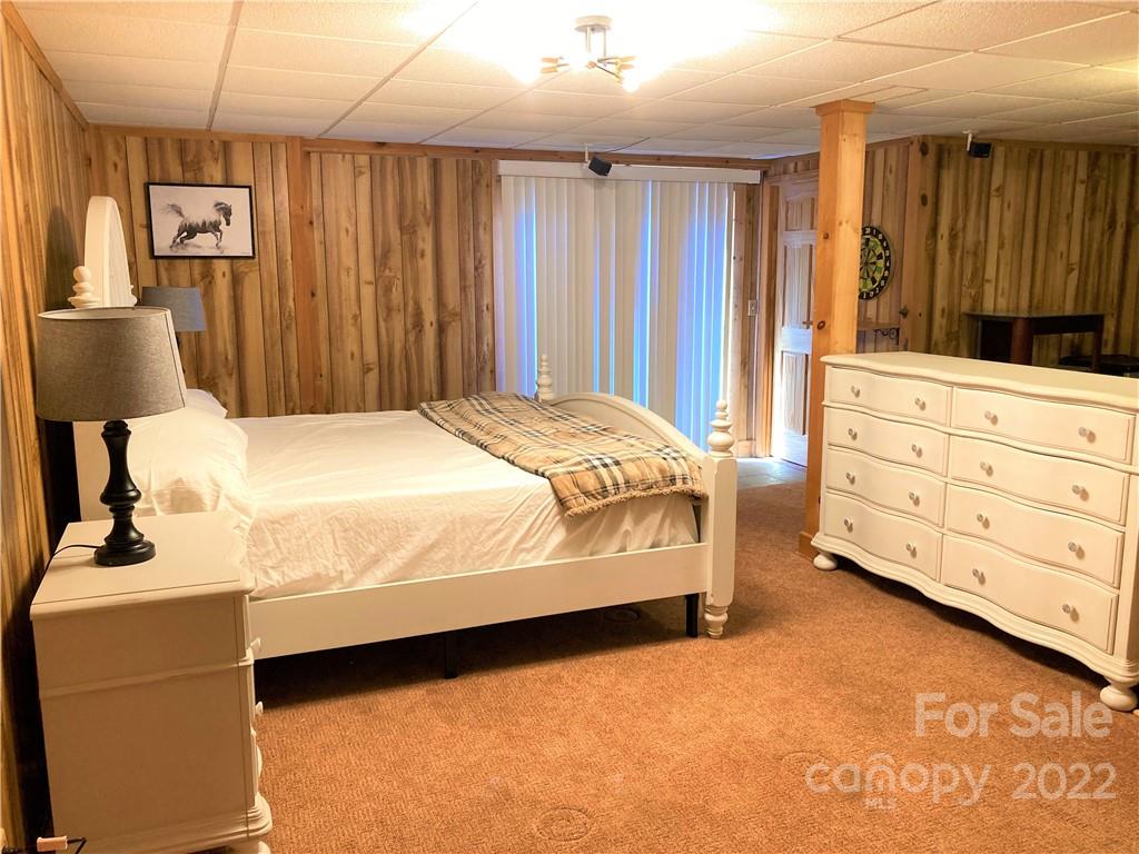 268 Sasafras Ridge Rutherfordton, NC 28139 - Photo 22 of 48 a bedroom with a bed and a dresser