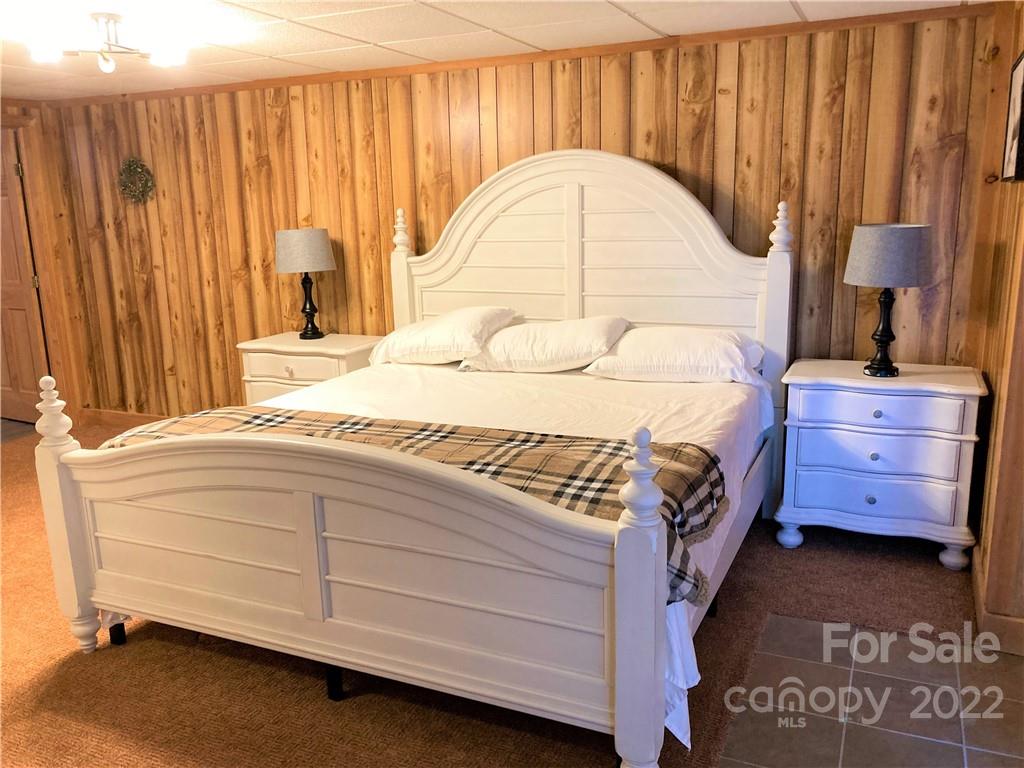 268 Sasafras Ridge Rutherfordton, NC 28139 - Photo 27 of 48 a bedroom with a bed and a dresser