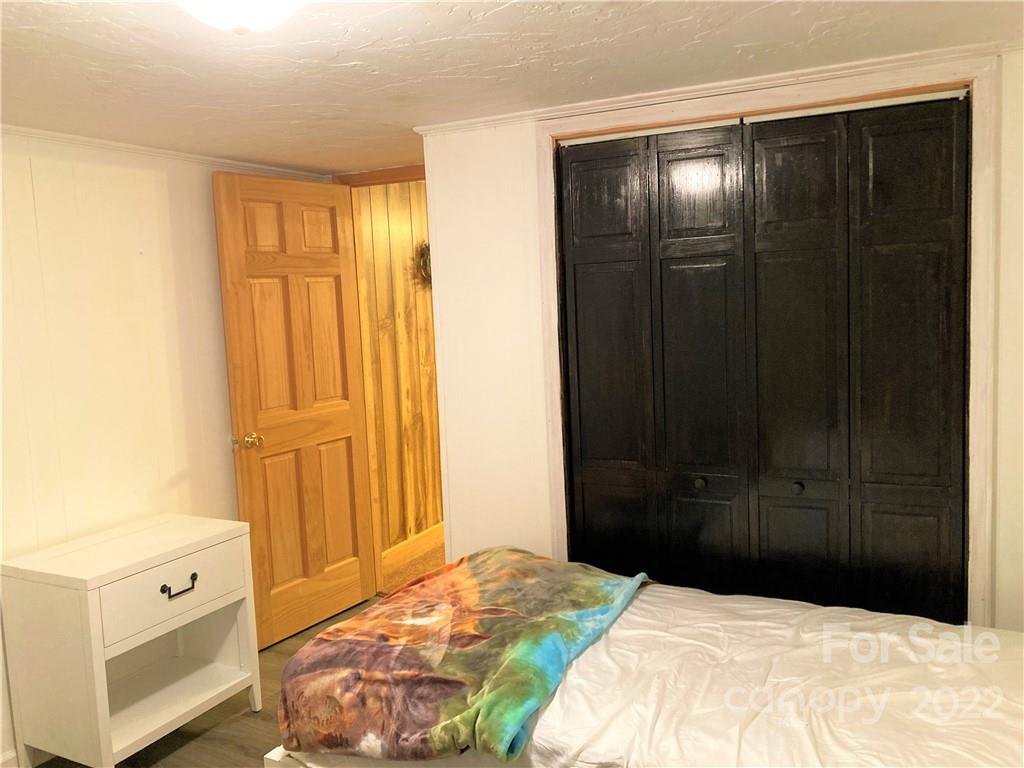 268 Sasafras Ridge Rutherfordton, NC 28139 - Photo 29 of 48 a bedroom with a bed and a dresser