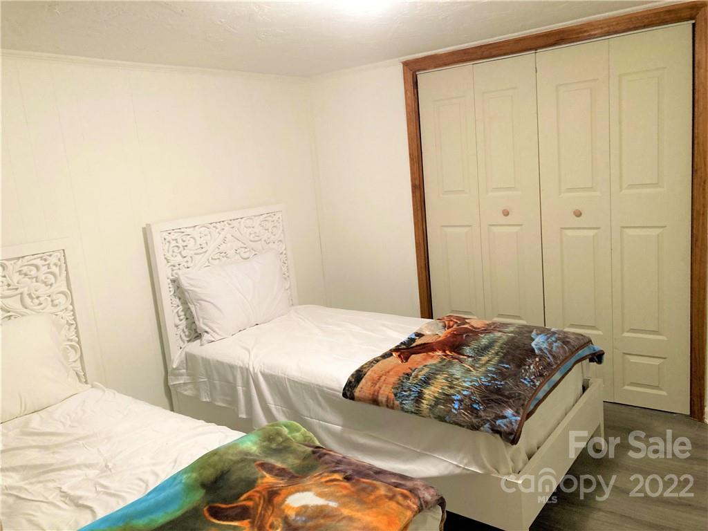 268 Sasafras Ridge Rutherfordton, NC 28139 - Photo 30 of 48 a bedroom with a bed and a dresser